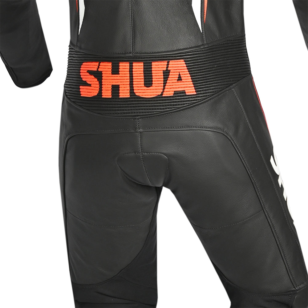 shua-mono-1pc-infinity-man-negro-naranja-mid-back-view